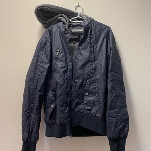 Guess large jacket. been stored away in plastic vacuumed bag. worn once